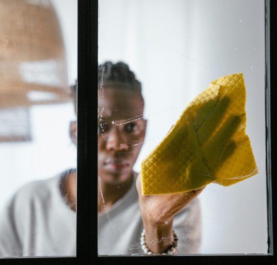 a man cleaning windows